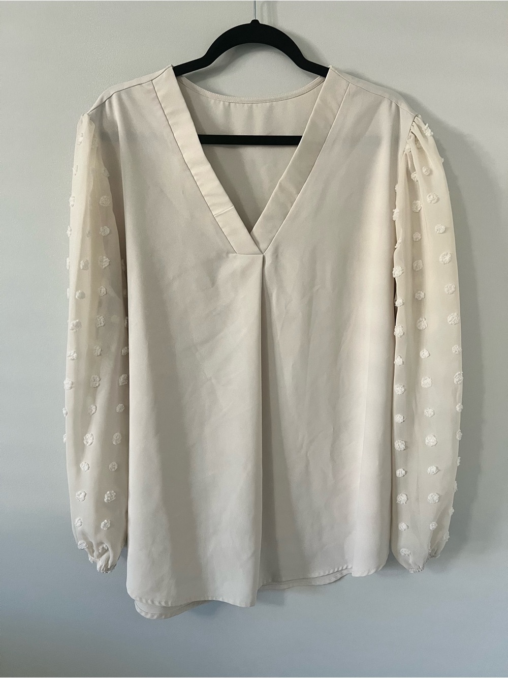 Elegant Cream V-Neck Blouse with Sheer Dotted Sleeves